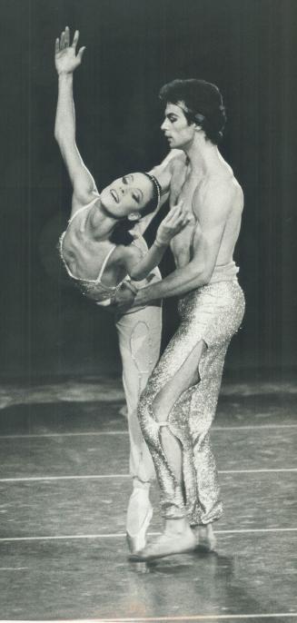 Dazzling duo: Dressed in shimmery gold, dancers Karen Kain and Frank Augustyn sizzle through a pas de deux from Le Corsair at Ontario Place