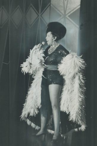 Still showing remarkable legs under single spotlight, singer Josephine Baker last night opened a two-week engagement in the Royal York Hotel's Imperial Room