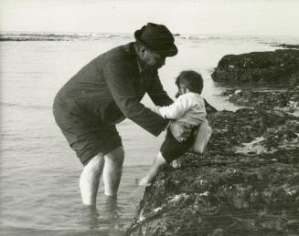 Arthur Conan Doyle at the seaside with his son Denis [A]