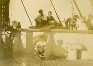 Denis Conan Doyle with crew members of the Naldera