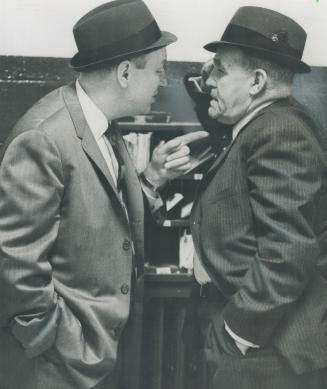Remember, second Sunday. With mock severity, Punch Imlach (left) orders King Clancy to 'have 'em second when I take over Sunday.' After hectic final p(...)