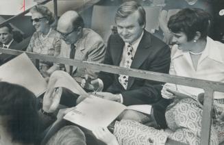 Conservative autographs. Mr. and Mrs. Robert Stanfield, left, seated beside Ontario Premier William Davis and his wife Kathleen, are kept busy signing(...)
