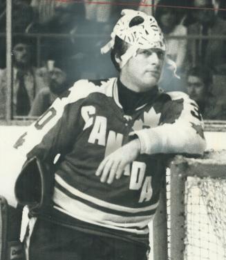 Looking unconcerned, Team Canada goalie Gerry Cheevers stands by the net during the argument over whether the Soviet Union had scored a goal. The puck(...)