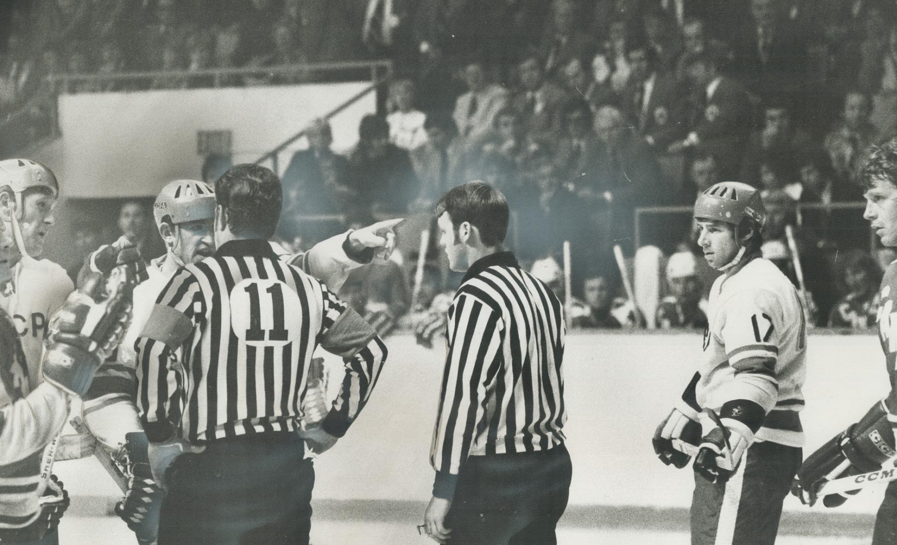 USSR Players dispute the disallowed goal with the officials