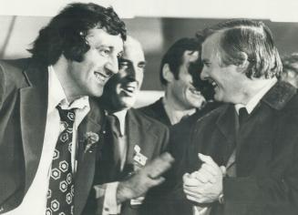 Happy Davis. A delighted Premier William Davis exchanges word with Phil Esposito at last night's city hall welcoming