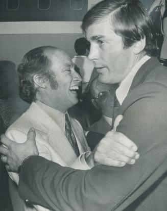 Pierre meets Pete. Prime Minister Pierre Trudeau hugs Team Canada forward Pete Mahovlich as the conquering heroes arrived home last night from Europe