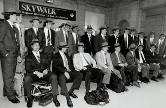 Old-time hockey: The Leafs, sporting fedoras, gather at Union Station yesterday prior to boarding their train for Montreal and a date with the Canadiens tonight