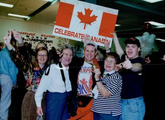 The world junior hockey champion return home to a joyous crowd at Pearson International Airport yesterday