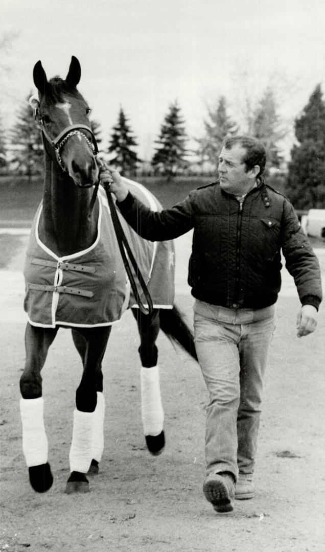 Queen's plate winner Bompago with John Carrella