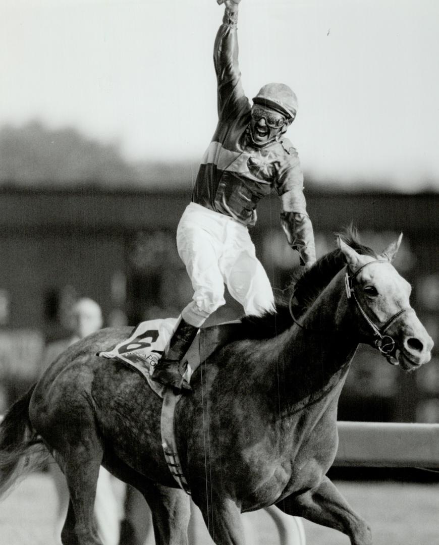 Double winner: Benburb, with Richard Dos Ramos up, is Canada's horse of year and Star photographer Jeff Goode won a Sovereign Award for this picture