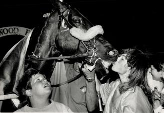 A kiss for a winner