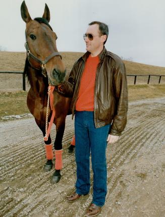 Horse and trainer are champs. Trainer Harry Poulton was honored recently as Horseman of the Year for training horses such as Stargaze Hanover, named A(...)