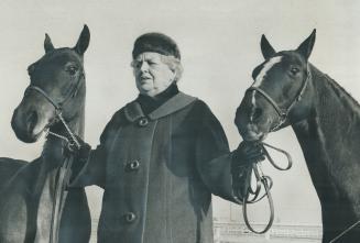Mrs. E. Armstrong with Dainty Doris (L), Mr. Sandman. They dominated harness pony classes in top horse shows
