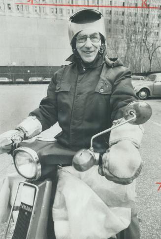 Fair weather or foul, 71-year-old Sam Schneiderman rides his motor cycle to work every day