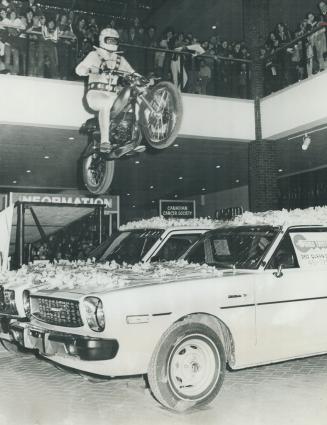 Raising funds the hard way. Paul Thruston, a 20-year-old Etobicoke youth who has been motorcycle-jumping cars for two years and, last year, leaped eig(...)