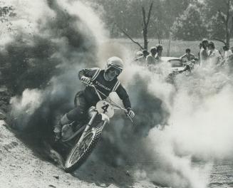 Through the air and the dust. In the European-style Moto-Cross track at Highways 10 and 401 in Mississauga, contestants on motor bikes soar through th(...)