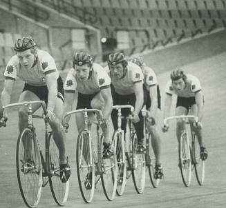 The bicycles. Working out before the games start are Canadian cyclists: (from the left) Brian Keast, Louis Corbeil and Frank Udtke