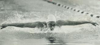 Susan Sloan sets commonwealth record in the 100-metre butterfly at Etobicoke