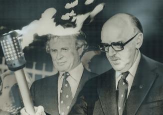 Olympic flame, which lit Montreal Mayor Jean Drapeau's imgination for 13 years as he struggled to bring the Olympic Games to his city, illuminates him(...)