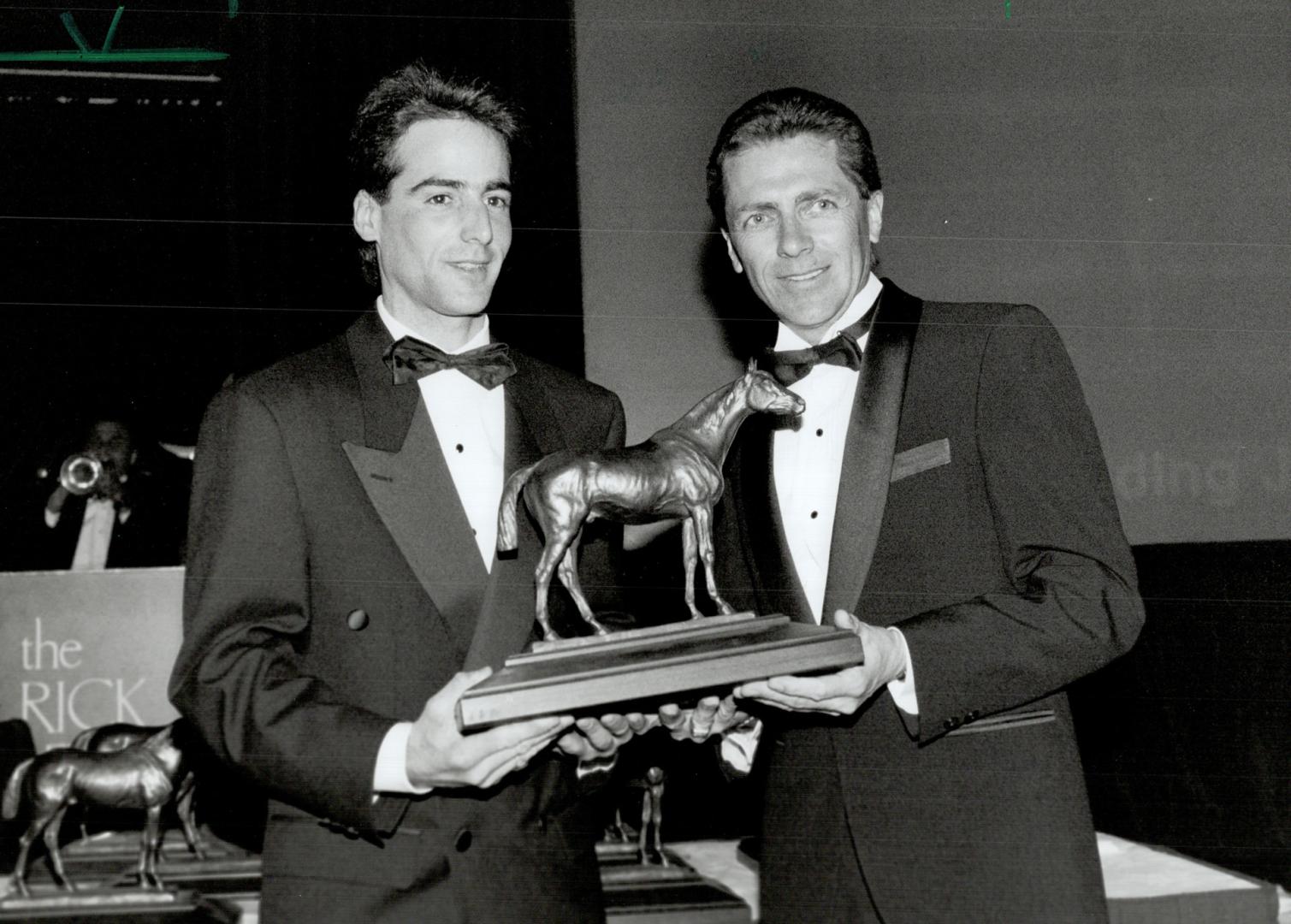 Robert Landry Receiving award from irwin Driedger