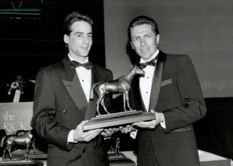 Robert Landry Receiving award from irwin Driedger