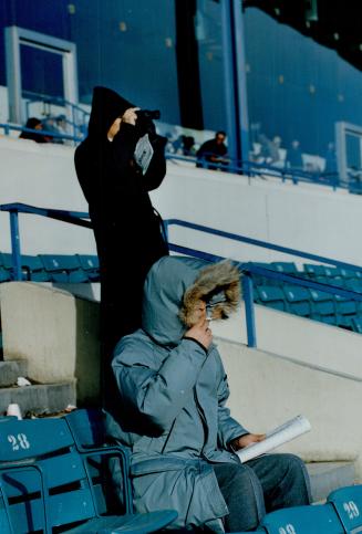 Here's some real fans. The weather was Arctic at Greenwood yesterday, but these fans didn't stay inside to watch the action on TV monitors. For what the frozen saw
