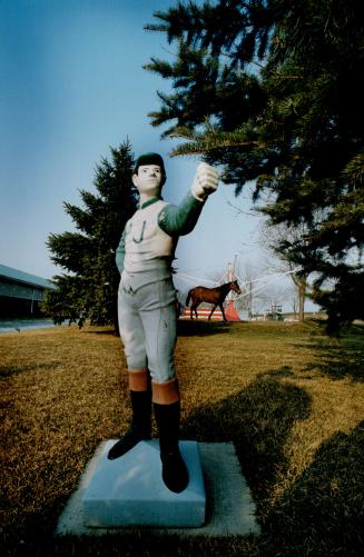 The Horsey set: Statue of jockey graces a barn on backstretch at Woodbine