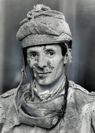 No zip: Mud-splattered jockey John Bell said his mount, Anita's Warrior, usually is a good mudder but failed to show any fire when he ran in the fifth race yesterday
