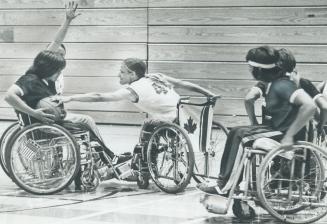 Two basketball teams vie for athletic awards at handicapped Olympics last year