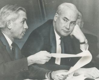 Metro Chairman William Allen (left) cautioned members of the Toronto Olympic Steering Committee yesterday that we must keep away from being over-whelm(...)
