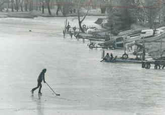 Metro's biggest hockey rink is at Michael Coyle's disposal as he skates by himself with a hockey stick and puck in the middle of the lagoon off Algonq(...)