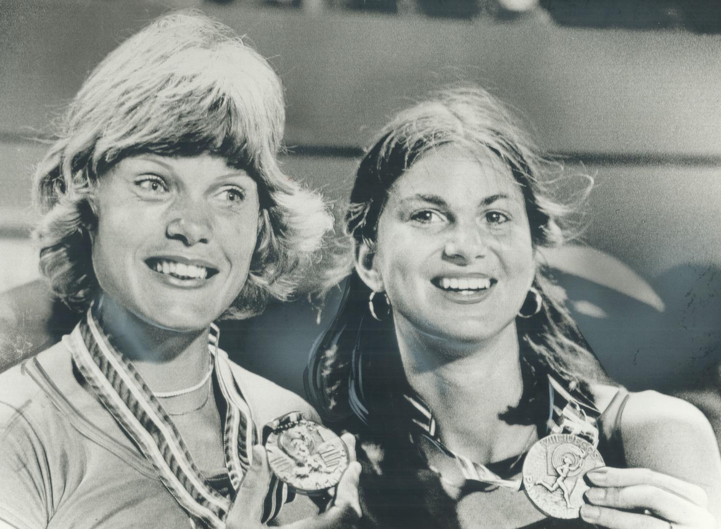 Diane Jones Konihowski, left, and Jill Ross display gold and bronze medals won in pentathlon