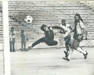 Jomo Sono scores against New England's Kevin Keenan during last season's North American Soccer League action