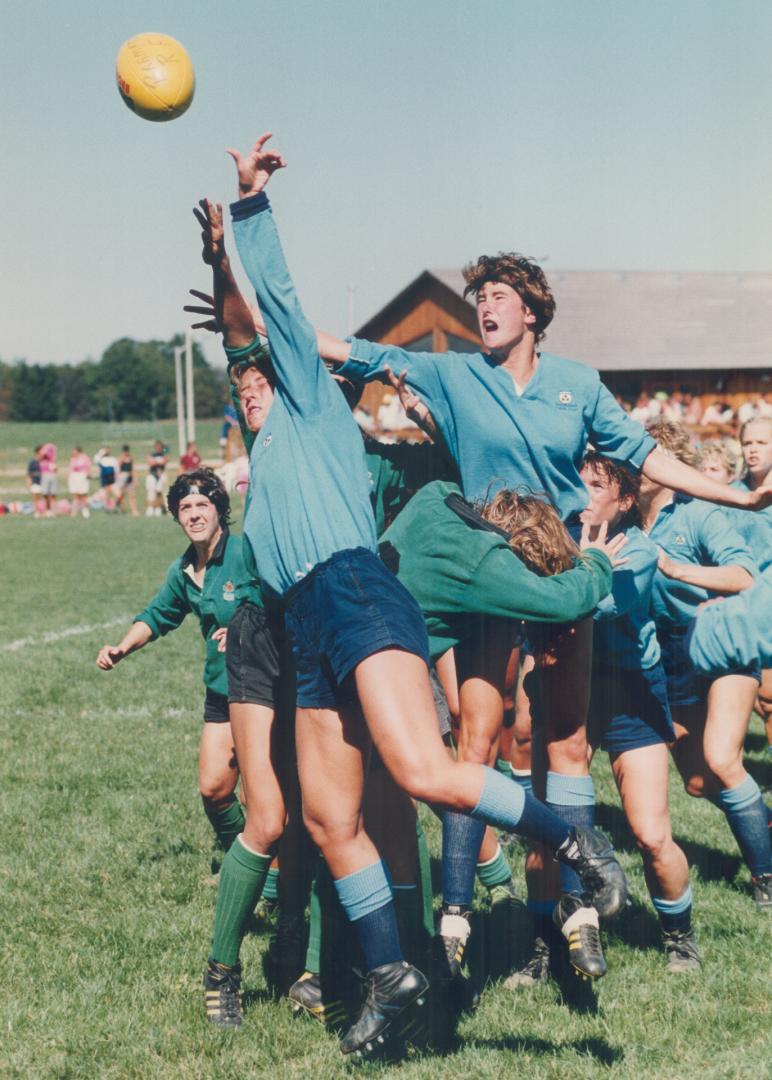 And the tip-off goes to. . ., Ontario players (in blue) battle with Saskatchewan counterparts as the ball pops high in air during lineout at the women(...)