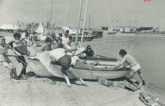 An advance taste of sailing lessons is enjoyed by this group of boys and girls from North York's Fenside Arena branch of the parks and recreation summ(...)