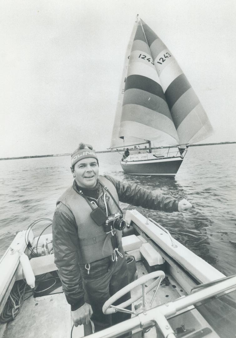 Sail maker and sail master is Hans Fogh, 39, who was out on Lake Ontario last weekend testing a new split sail design, on the boat in rear. He'll be o(...)