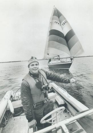 Sail maker and sail master is Hans Fogh, 39, who was out on Lake Ontario last weekend testing a new split sail design, on the boat in rear. He'll be o(...)
