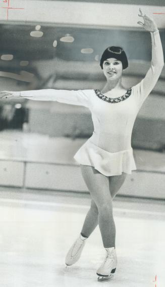 Champion Skating from is shown by 17-year-old Elizabeth Purtle, this year's Miss Scarborough, a double Canadian gold medalist in figure skating, winne(...)