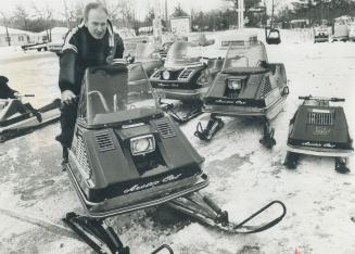 This is Boomsville, says Bing Jowett as he manoeuvres a snowmobile at his service station and snowmobile agency at Wasaga Beach. He moved his wife and(...)