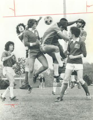 Players from Winston Churchill and Midland use their heads in Scarborough high school final