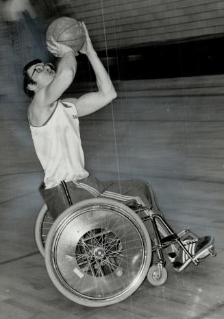 He's a star: Floris Aukema, who lost his left leg below the knee in 1972, is on target with Toronto Spitfires of Southern Ontario Wheelchair Basketball League