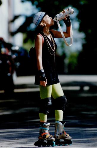 4. Model Amy Cable is stylish in a James Yunker shorts-jumper, Comrags tights. Cap, North, knapsack, Gucci, skates, Rollerblade