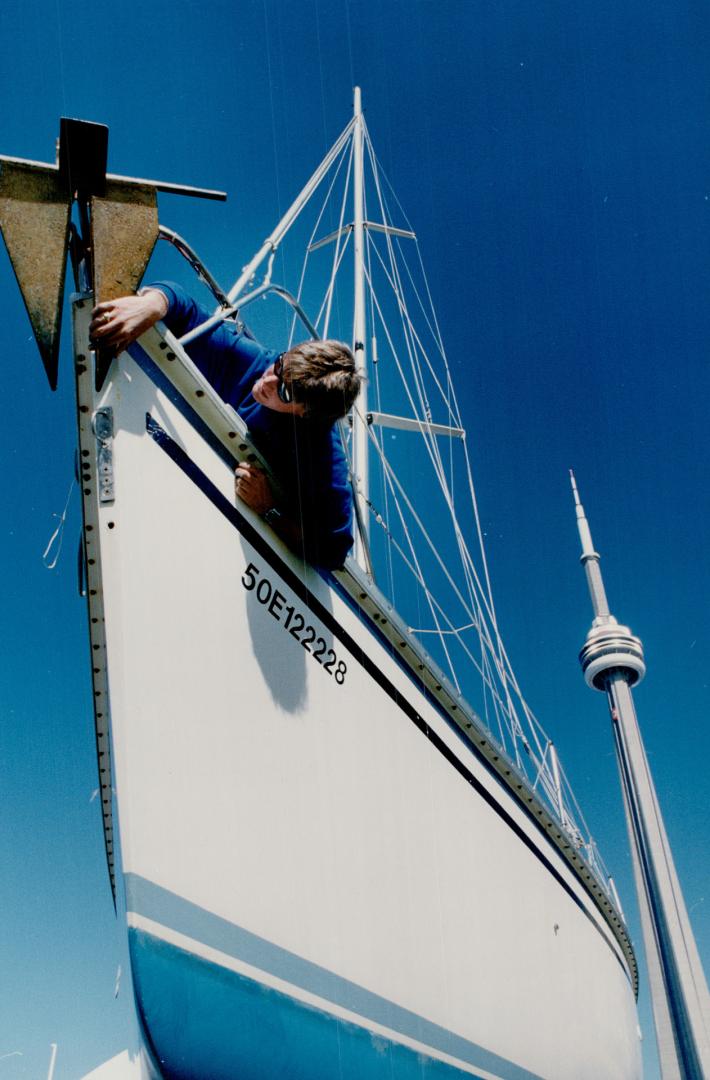 Shaping up for shipping out, Kevin Wrigley, 23, gets the 11-metre (37-foot) sailboat Neighbours ready for its annual cruise to the British Virgin Isla(...)