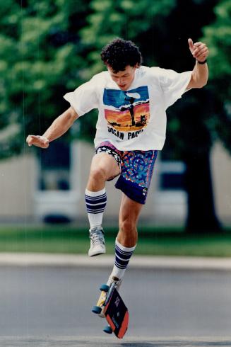 Left, Arizona freestyle pro Victor Starr in Ocean Pacific screen-printed cotton T-shirt, $18, and Kneebusters, $36, socks, MacGregor, watches, Swatch