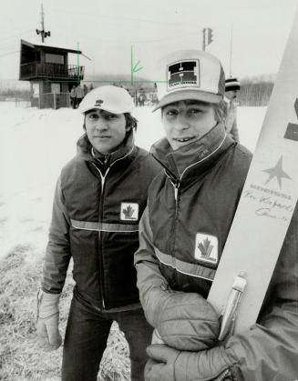 Brotherly help: Ron Richards, right, ranked 32nd in the ski-jumping world, and his brother, Randy, who helps coach Canadian team, head up Big Thunder run at Thunder Bay