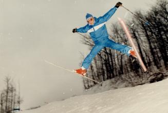 Josef Pfurtscheller, 38. ski instructor at Blue Mountain, shows his talents with a manoeuvre called the spread eagle