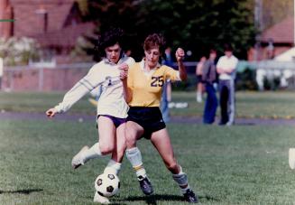 Putting best feet forward, Winston Churchill's Colleen Mulholland (7) fights for the ball with R