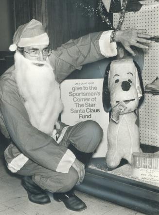 Behind those Santa Togs in Garry Moore, co-manager of Shea's Cedarbrae Bowling Centre