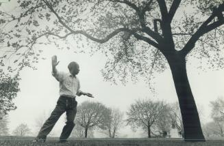 Rooted in tradition. The spreading branches of the trees in Riverdale Park arch skyward, mirroring the grace of Nan Tan as he does his tal chi exercis(...)
