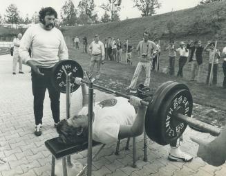 Shot Putter Bruce Pirme of Saskatchewan weights excercise